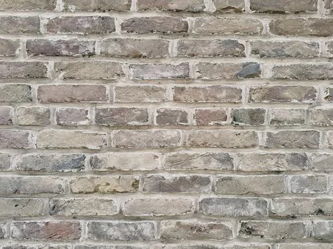 Textured background of an old brick wall with natural colors Stock Photos