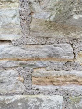 Textured background of the old stone wall. Stock Photos