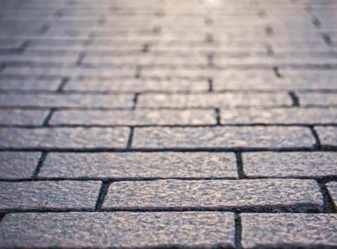Textured background of a pavement stone Stock Photos