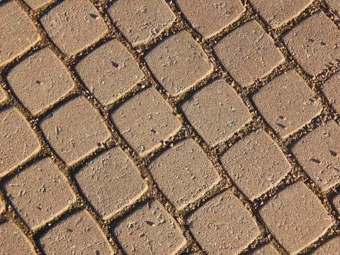 Textured background of a pavement stone Stock Photos