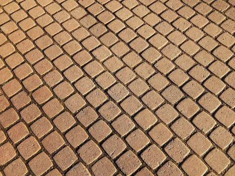 Textured background of a pavement stone Stock Photos