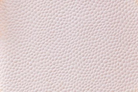Textured background presenting an abstract repeating pattern of small, unev.. Stock Photos