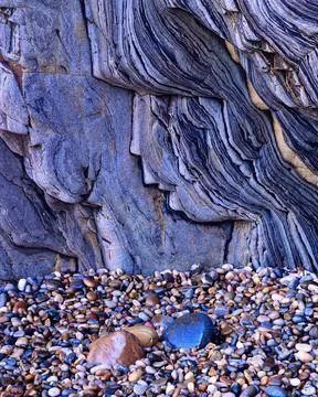 Textured background of rough surface of rock Stock Photos
