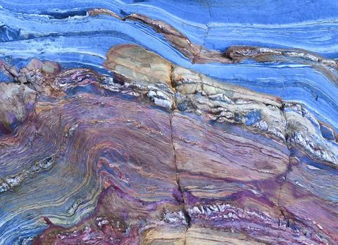 Textured background of rough surface of rock Stock Photos