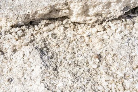 Textured background of the salt. Selective focus. Close up of salt. Stock Photos