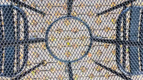 The textured background of a small table and chairs for a cafe in a weather.. Stock Photos