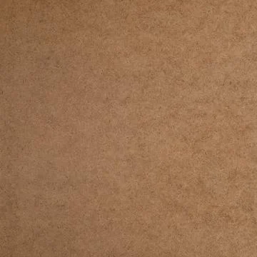 Textured background from the smooth side of hardboard. Stock Photos