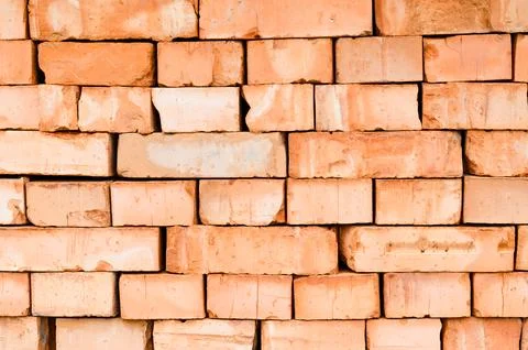 Textured background of stacked bricks Stock Photos
