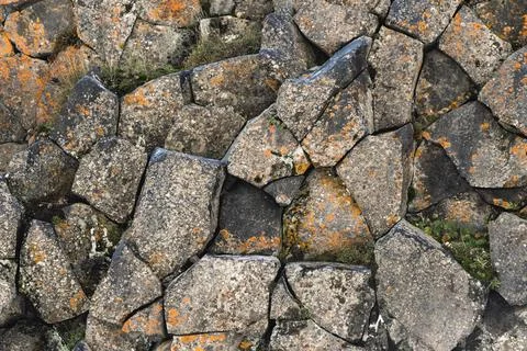 Textured basalt background hexagonal stone pillars in a section. natural v... Stock Photos