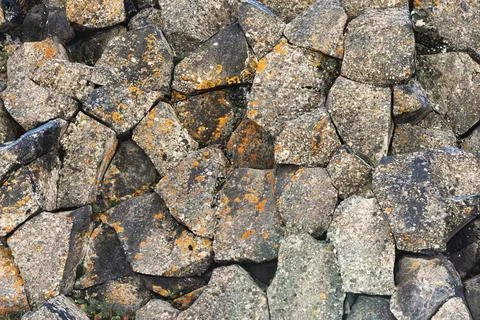 Textured basalt background hexagonal stone pillars in a section. natural v... Stock Photos