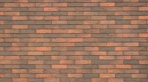 Textured Bavarian brickwork with offset bricks in shades of brown. Stock Photos