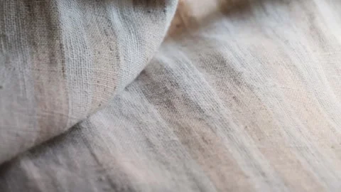 Textured beige fabric close up. Background and texture. Stock Footage 323305094