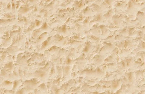 Textured beige plaster or clay surface background with artistic swirly hand Stock Illustration