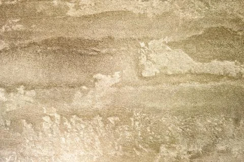 Textured beige wall with subtle patterns suggesting natural elements and organic Foto stock