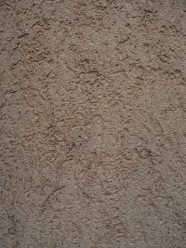 Textured Beige Wall Surface with Subtle Patterns Foto stock