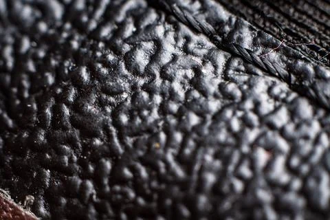 Textured black fabric with intricate pattern details suitable for various design Stock Photos