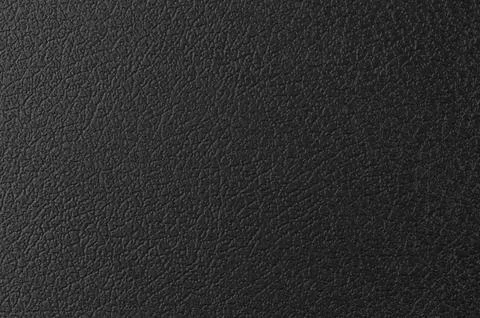 Textured black surface with intricate patterns showing depth and dimension .. Stock Photos