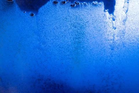 Textured blue abstract image with small bubbles and organic patterns. Stock Photos