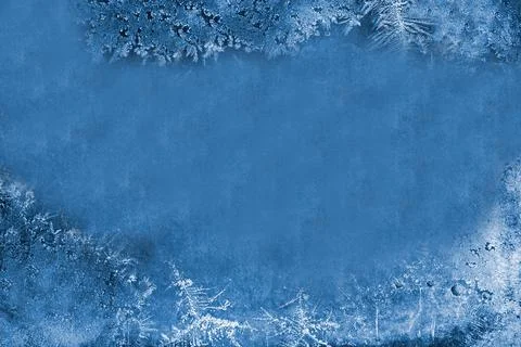 Textured blue background pattern made by frost on the window Stock Photos
