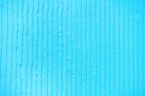 Textured blue background with plaster vertical lines and stripes Stock Photos