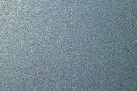 Textured blue plastic surface background with fine grainy pattern Stock Photos