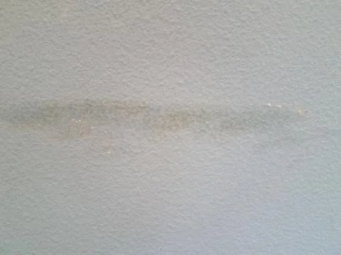 Textured blue wall up close with scratch Stock Photos