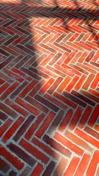 Textured brick surface adds depth and dimension to urban environment Stock Photos