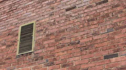 Textured brick wall with air vent Stock Footage 33756052