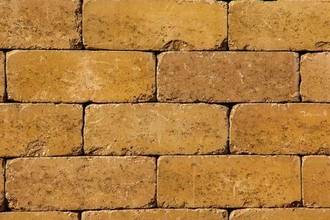 Textured brown background. Wall texture background. Brick wall construction.. Stock Photos