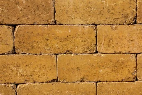 Textured brown background. Wall texture background. Brick wall construction.. Stock Photos