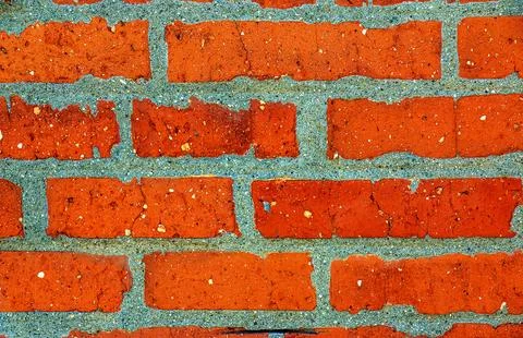 Textured brown background. Wall texture background. Brick wall construction.. Stock Photos