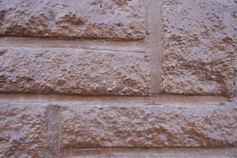 Textured brown brick wall surface 写真素材