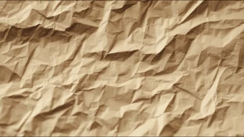 Textured brown paper background transforming from wrinkled to smooth in tim.. Stock Footage 314459293