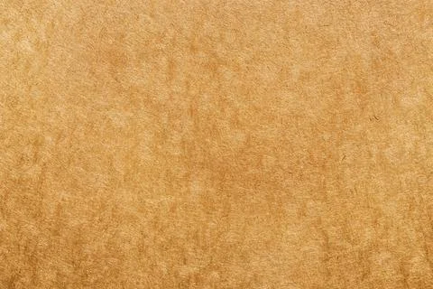 Textured brown paper surface close-up, versatile background Stock Photos