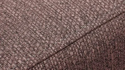 Textured Brown textile background with diagonal stitching Stock Photos