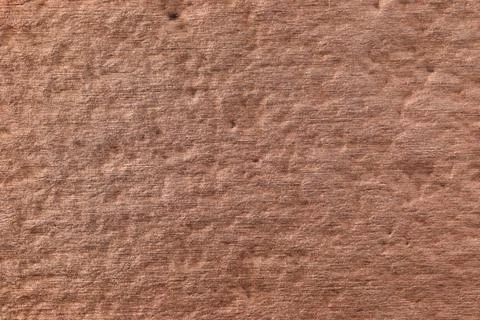 Textured brushed metallic background in copper color. Stock Photos