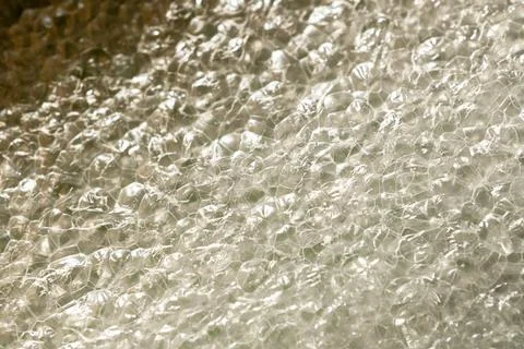 Textured bubble wrap for packaging. Packaging using non-ecological materials. Stock Photos