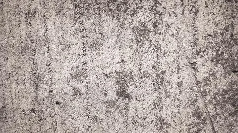 Textured cement wall with surface damage and cracks. Perfect for visual des.. Stock Photos