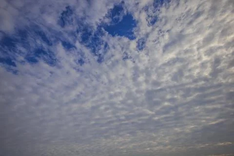 Textured clouds in a blue sky Stock Photos
