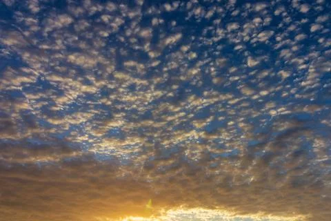 Textured clouds at sunset Stock Photos