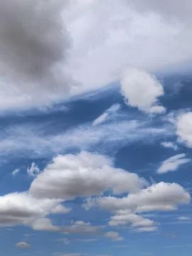 Textured Cloudscape with Blue Sky and White Clouds Stock Photos