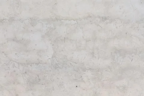 Textured concrete surface with subtle variations in color and pattern ideal for Stock Photos