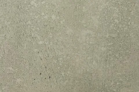 Textured concrete wall with subtle variations in color and pattern seen up close Stock Photos