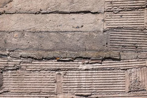 Textured Concrete Wall Surface with Horizontal Grooves Stock Photos