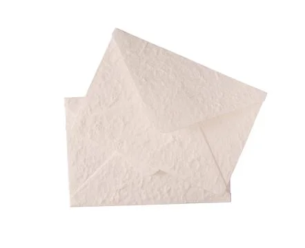 Textured cream envelope mock up with a subtle pattern and rustic feel Stock Photos