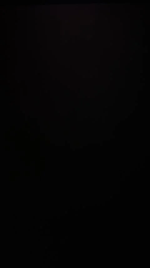 A textured dark surface with subtle scratches and stains, illuminated by a soft  Stock Footage 293470976