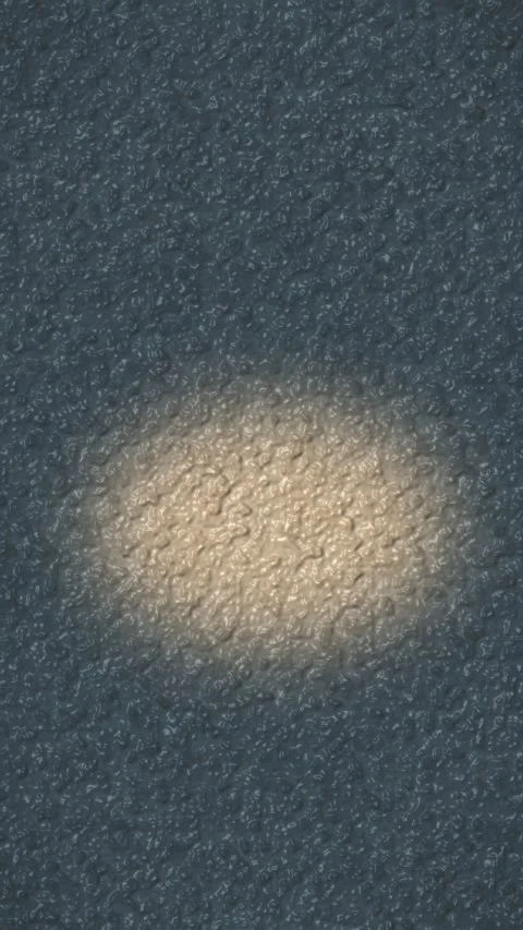 Textured dark surface with subtle spotlight effect. 2d animation 库存影片 344092076