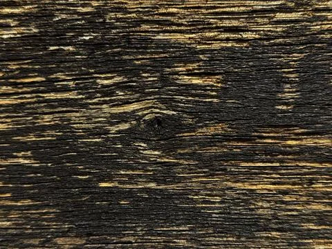Textured Dark Wood Surface Close-Up.Closeup of aged dark brown wooden surfa.. Stock Photos
