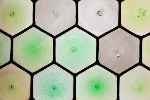 Textured decorative glass in a hexagonal pattern. Elements feature circular.. 写真素材