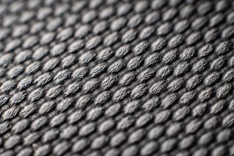 Textured fabric with geometric patterns showcasing vintage charm and modern Stock Photos